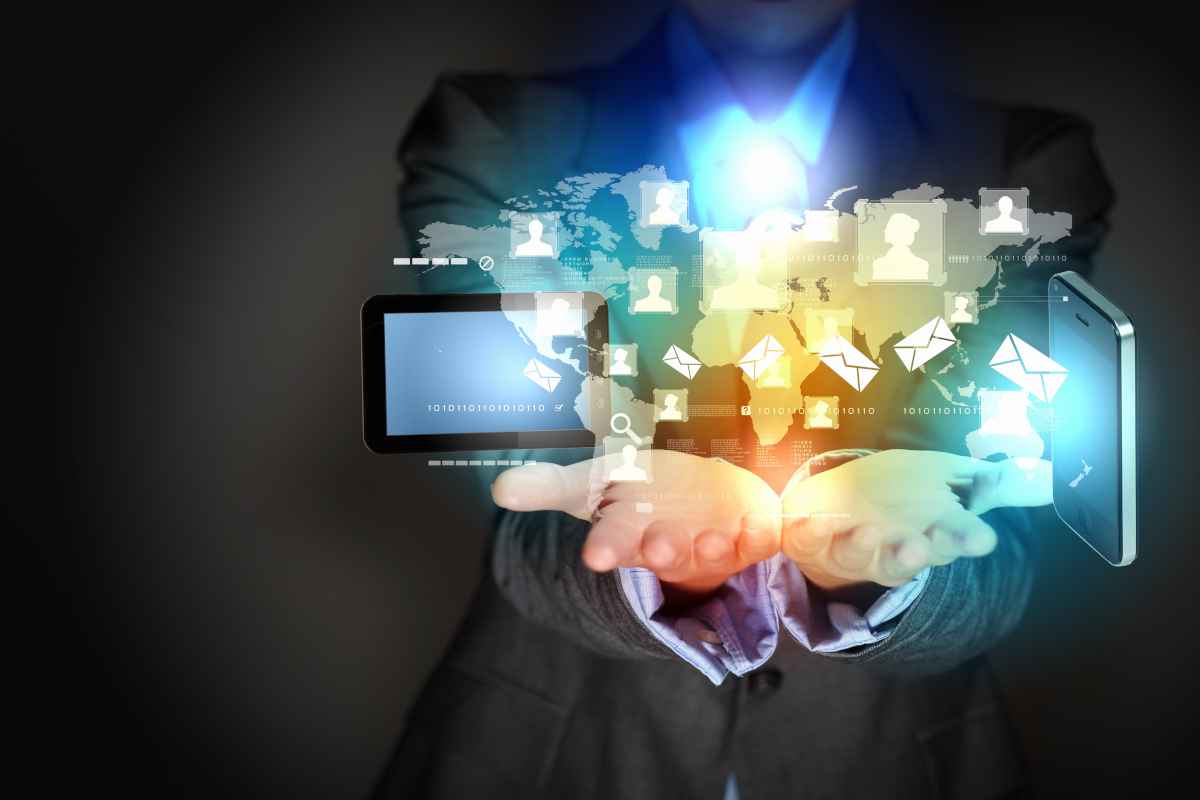 Man holding digital devices