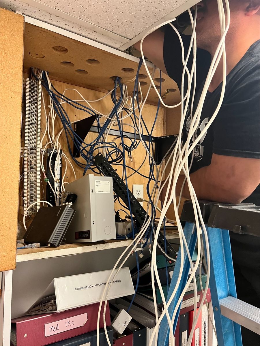 Cables being disconnected and equipment prepared for removal